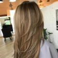 Стъпаловидна прическа: избор на дължина на косата, техника, снимка